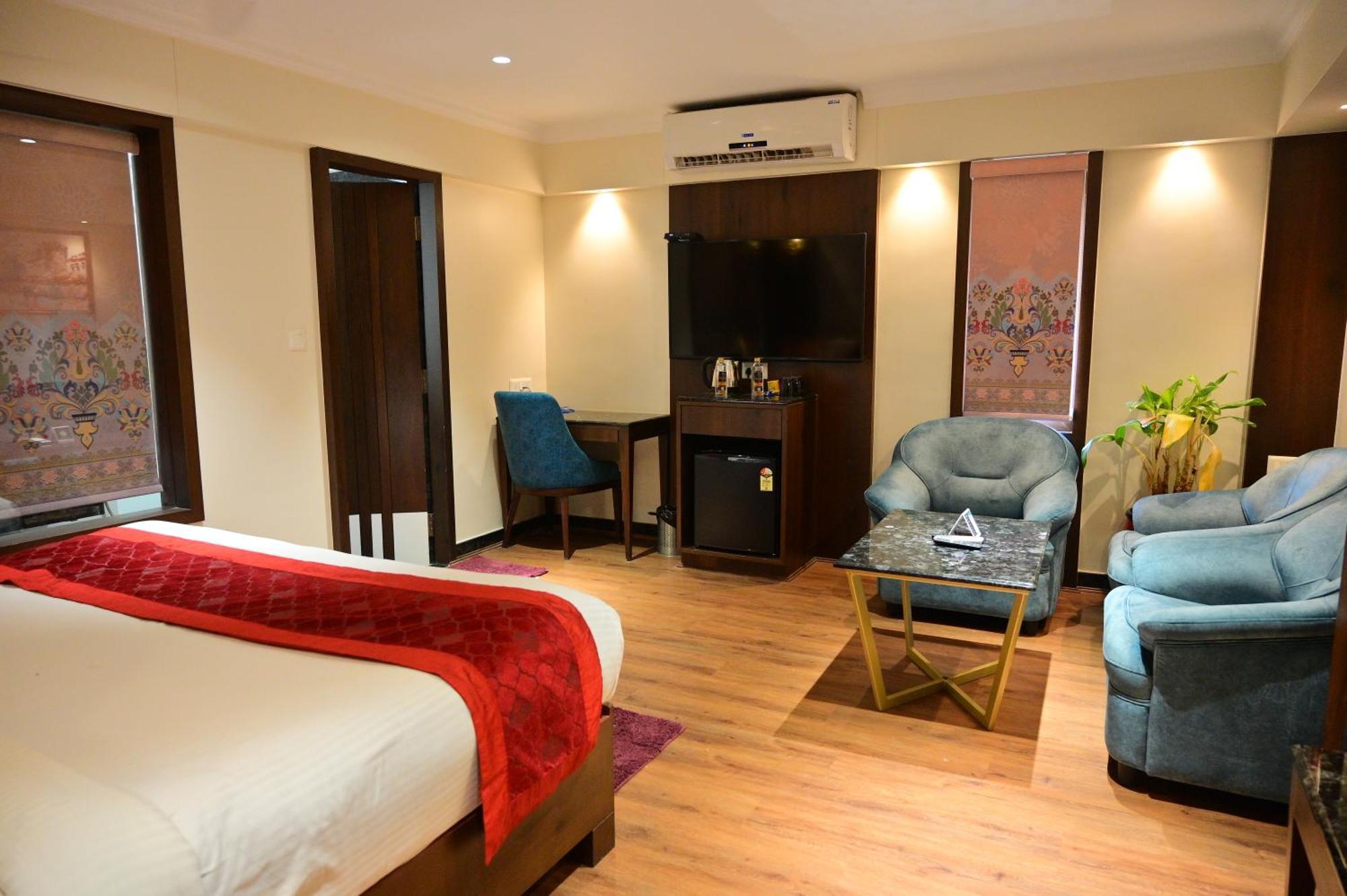 Hotel Golden Riviera Mysore Ruang foto